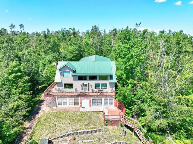 Luxury Home on 261 Acres – Atlanta, MI Wilderness Retreat