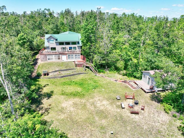 Luxury Home on 261 Acres – Atlanta, MI Wilderness Retreat