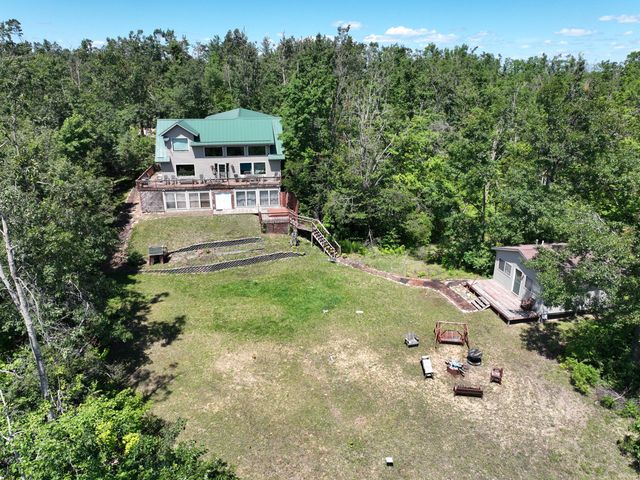 Luxury Home on 261 Acres – Atlanta, MI Wilderness Retreat