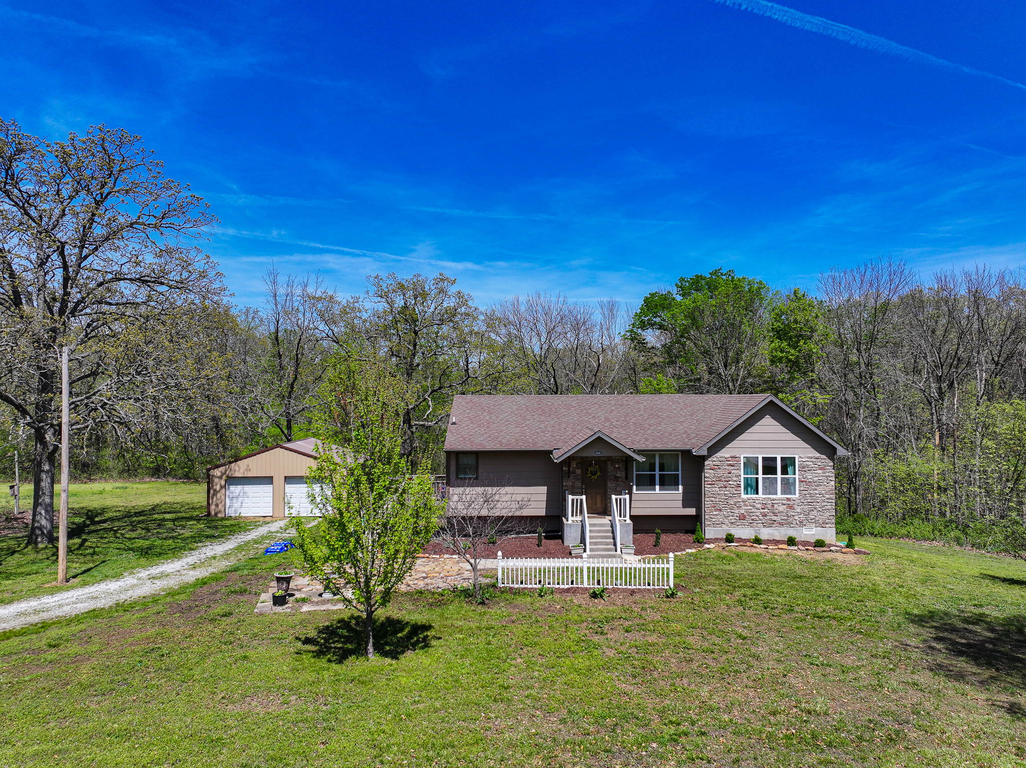 89+/- Acre Hunting property with a nice home and shop