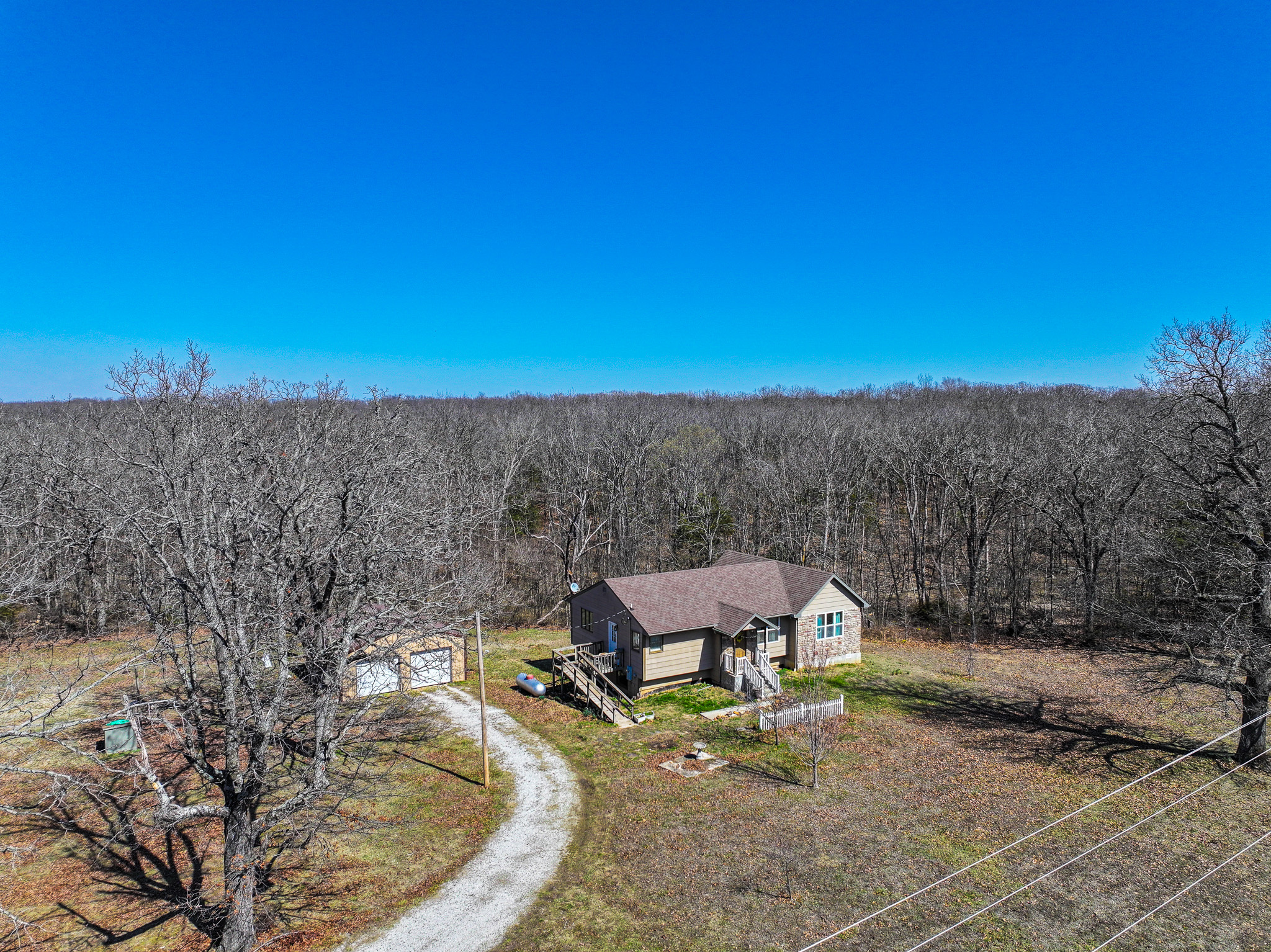 89+/- Acre Hunting property with a nice home and shop