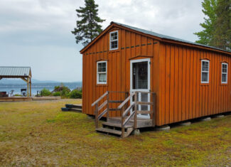 Camp with 584 Feet of Beachfront on Madagascal Pond