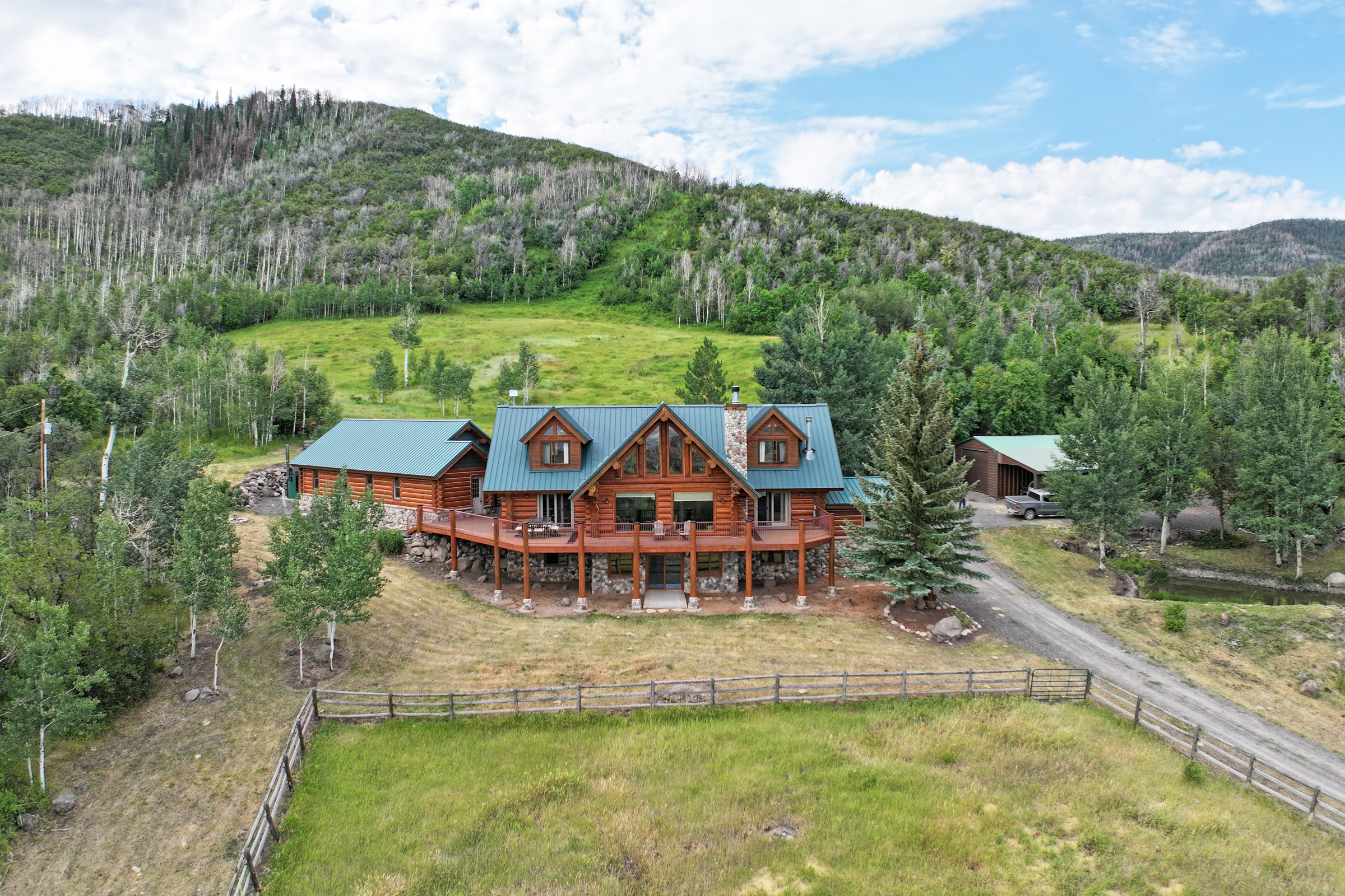Luxury Log Home on Multiple Parcels For Sale on the Western Slope of Colorado