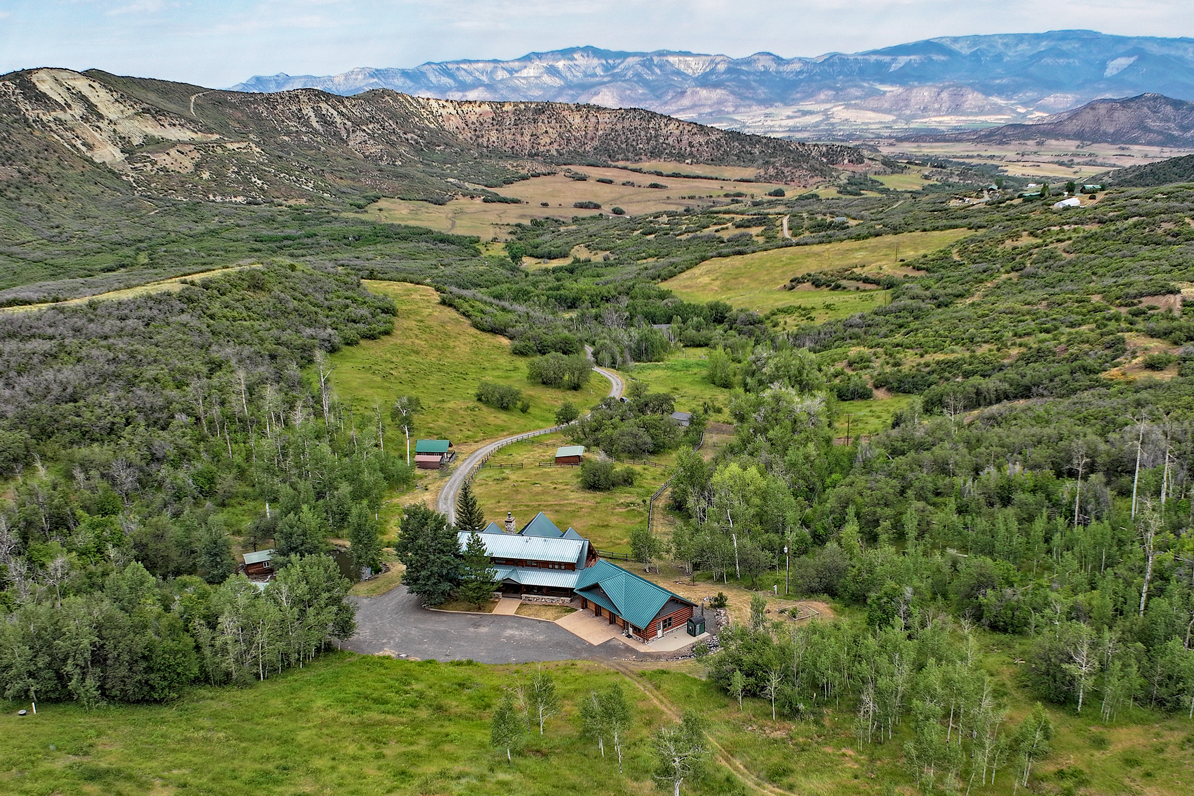 Luxury Log Home on Multiple Parcels For Sale on the Western Slope of Colorado