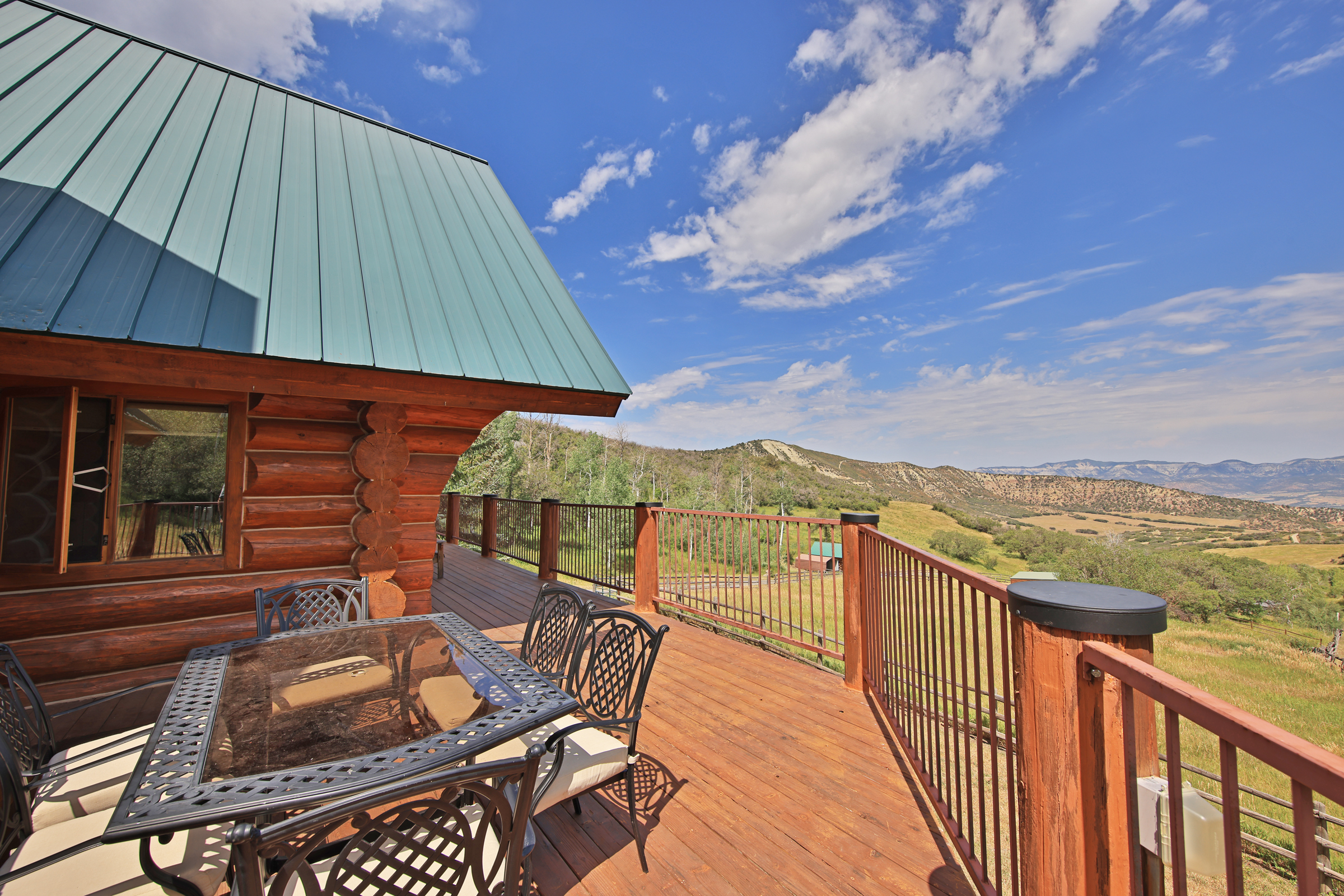Luxury Log Home on Multiple Parcels For Sale on the Western Slope of Colorado