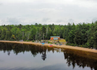 Camp with 584 Feet of Beachfront on Madagascal Pond