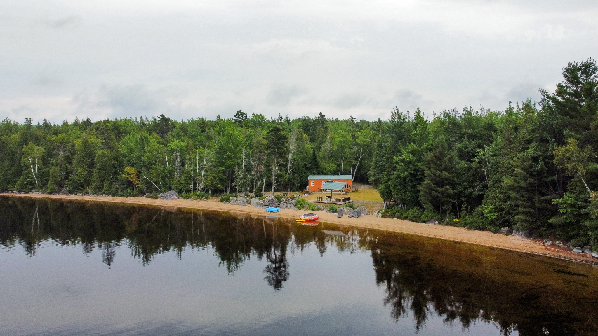 Camp with 584 Feet of Beachfront on Madagascal Pond
