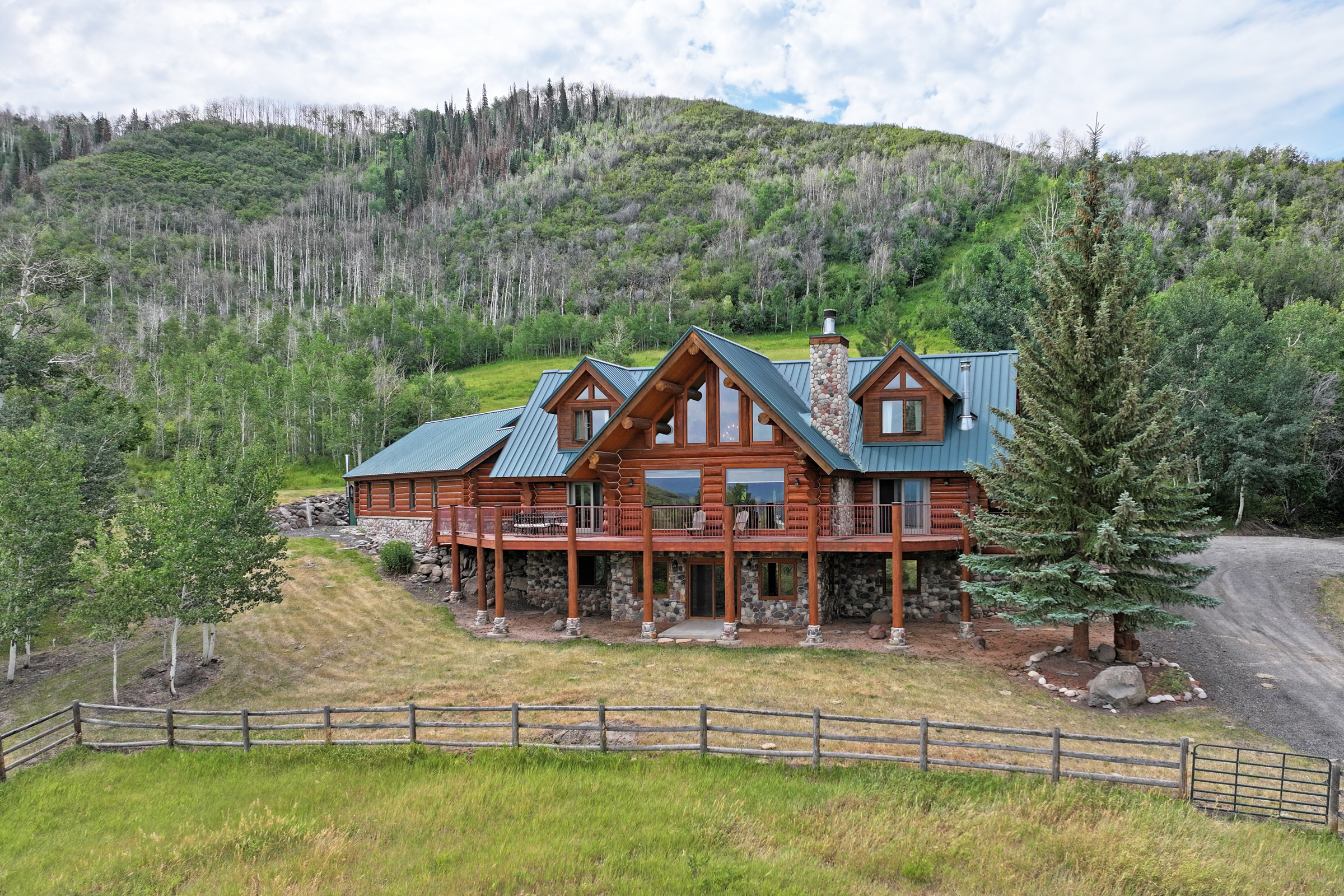 Luxury Log Home on Multiple Parcels For Sale on the Western Slope of Colorado