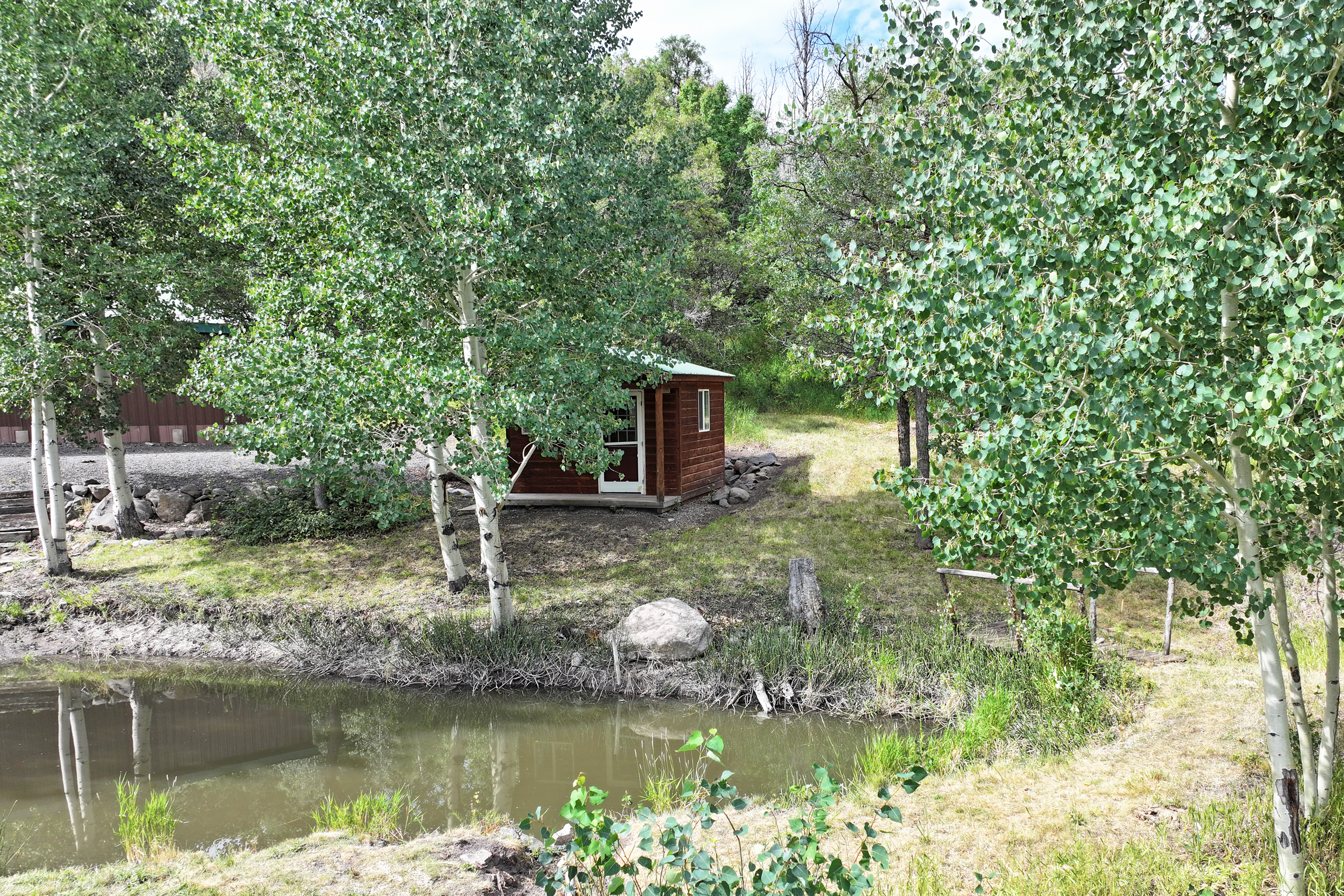 Luxury Log Home on Multiple Parcels For Sale on the Western Slope of Colorado