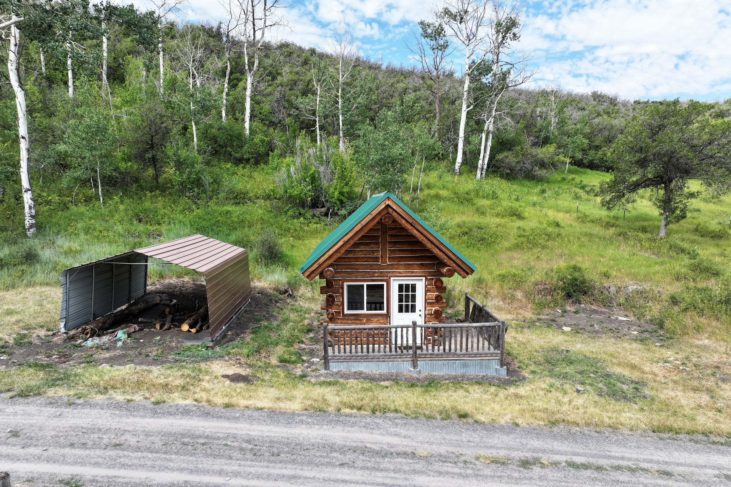 Luxury Log Home on Multiple Parcels For Sale on the Western Slope of Colorado