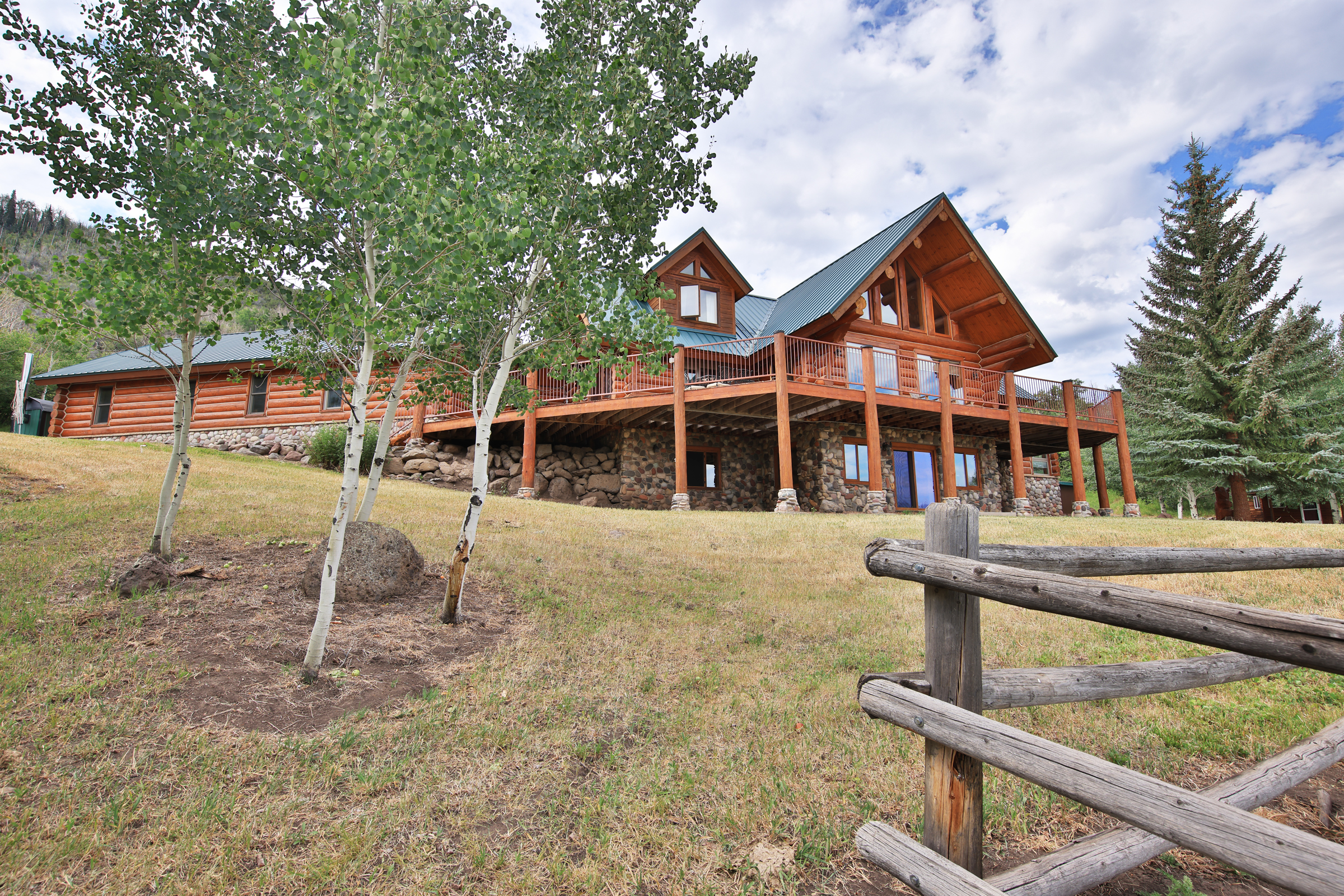 Luxury Log Home on Multiple Parcels For Sale on the Western Slope of Colorado