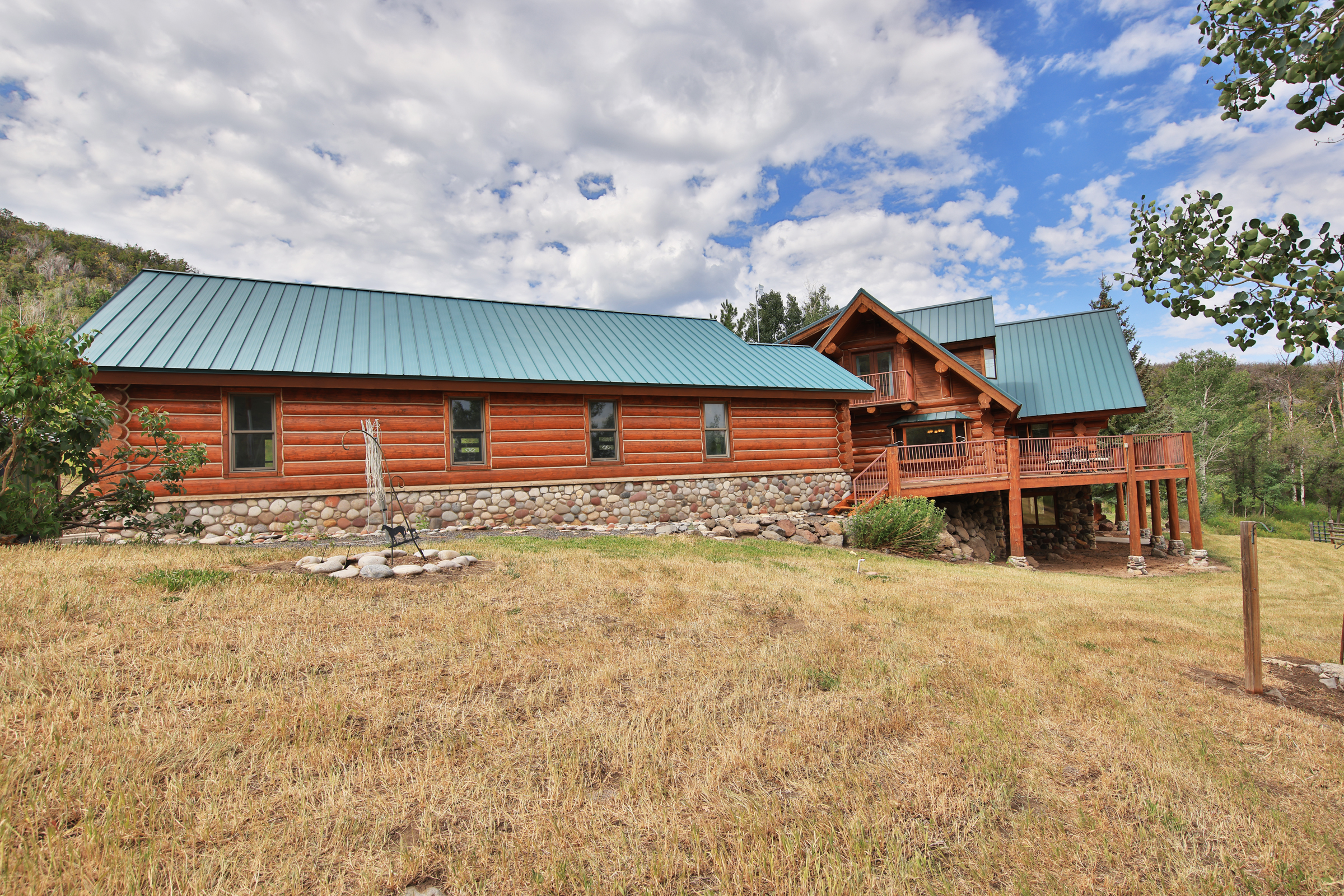Luxury Log Home on Multiple Parcels For Sale on the Western Slope of Colorado