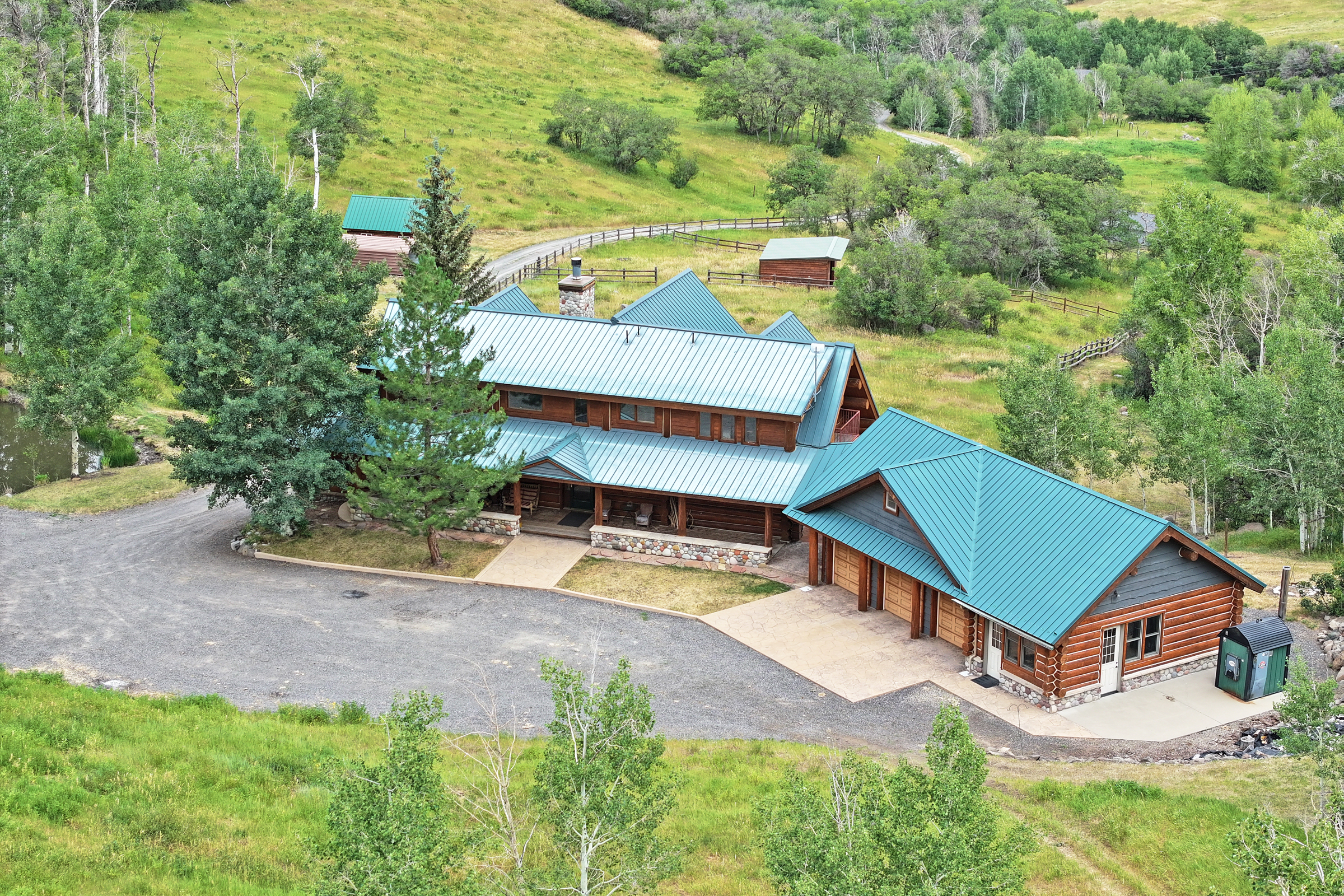 Luxury Log Home on Multiple Parcels For Sale on the Western Slope of Colorado