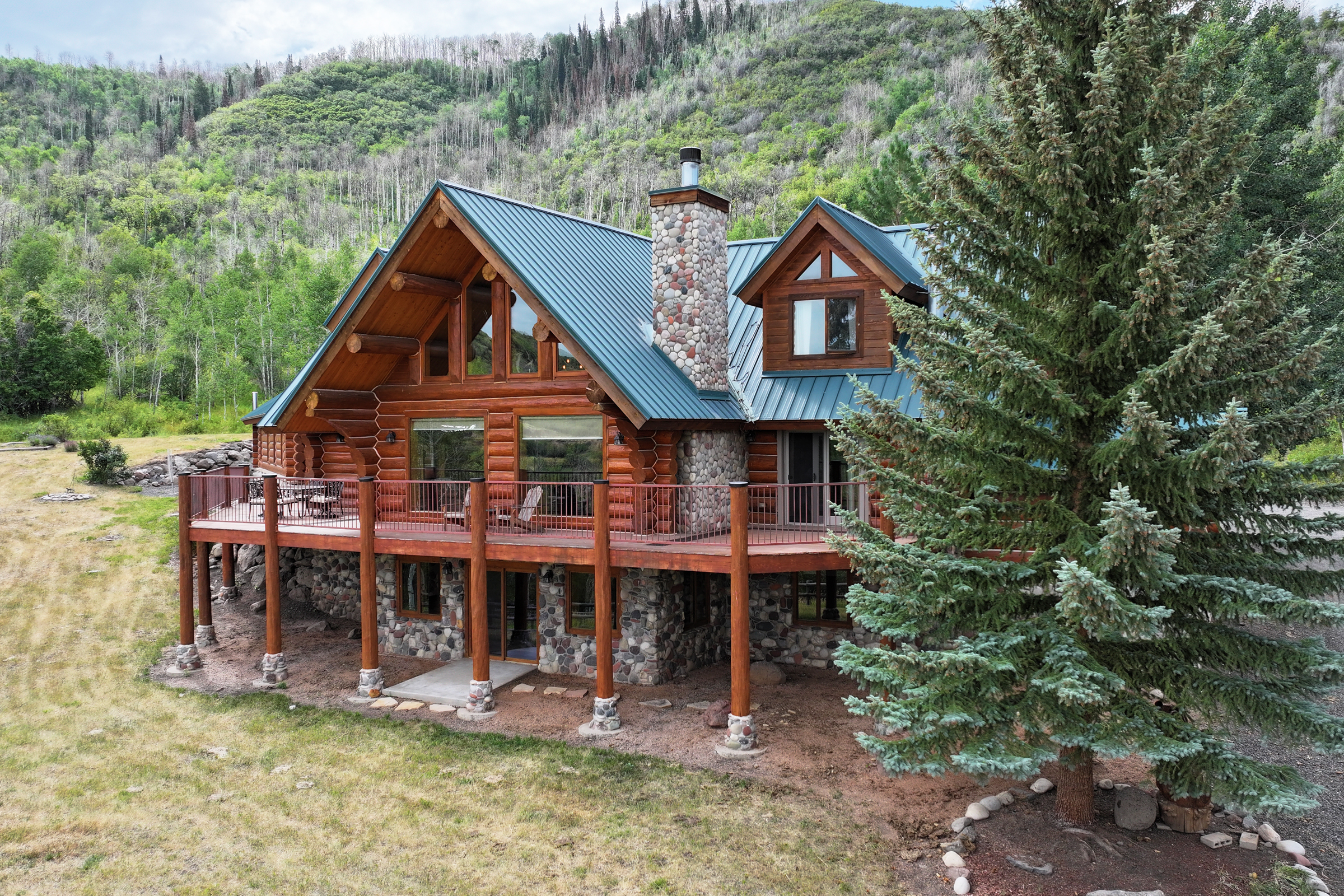 Luxury Log Home on Multiple Parcels For Sale on the Western Slope of Colorado