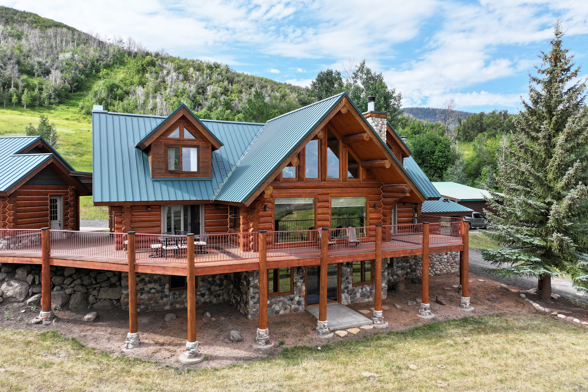 Luxury Log Home on Multiple Parcels For Sale on the Western Slope of Colorado