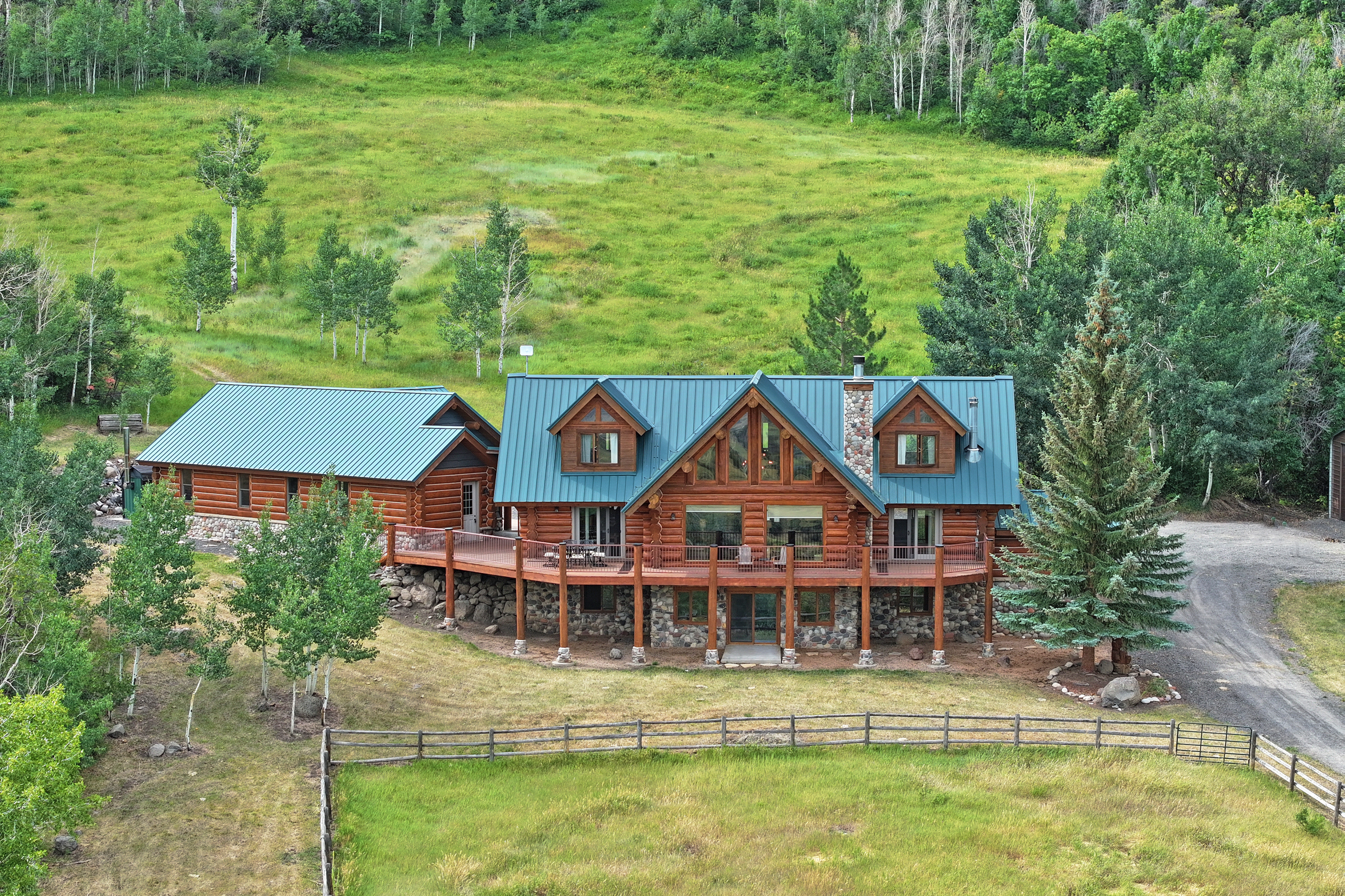 Luxury Log Home on Multiple Parcels For Sale on the Western Slope of Colorado