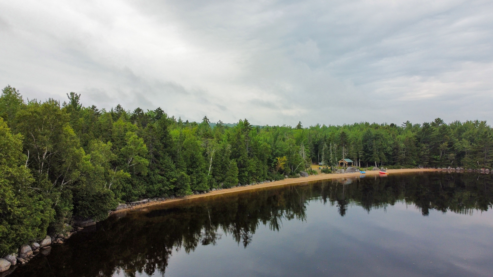Camp with 584 Feet of Beachfront on Madagascal Pond