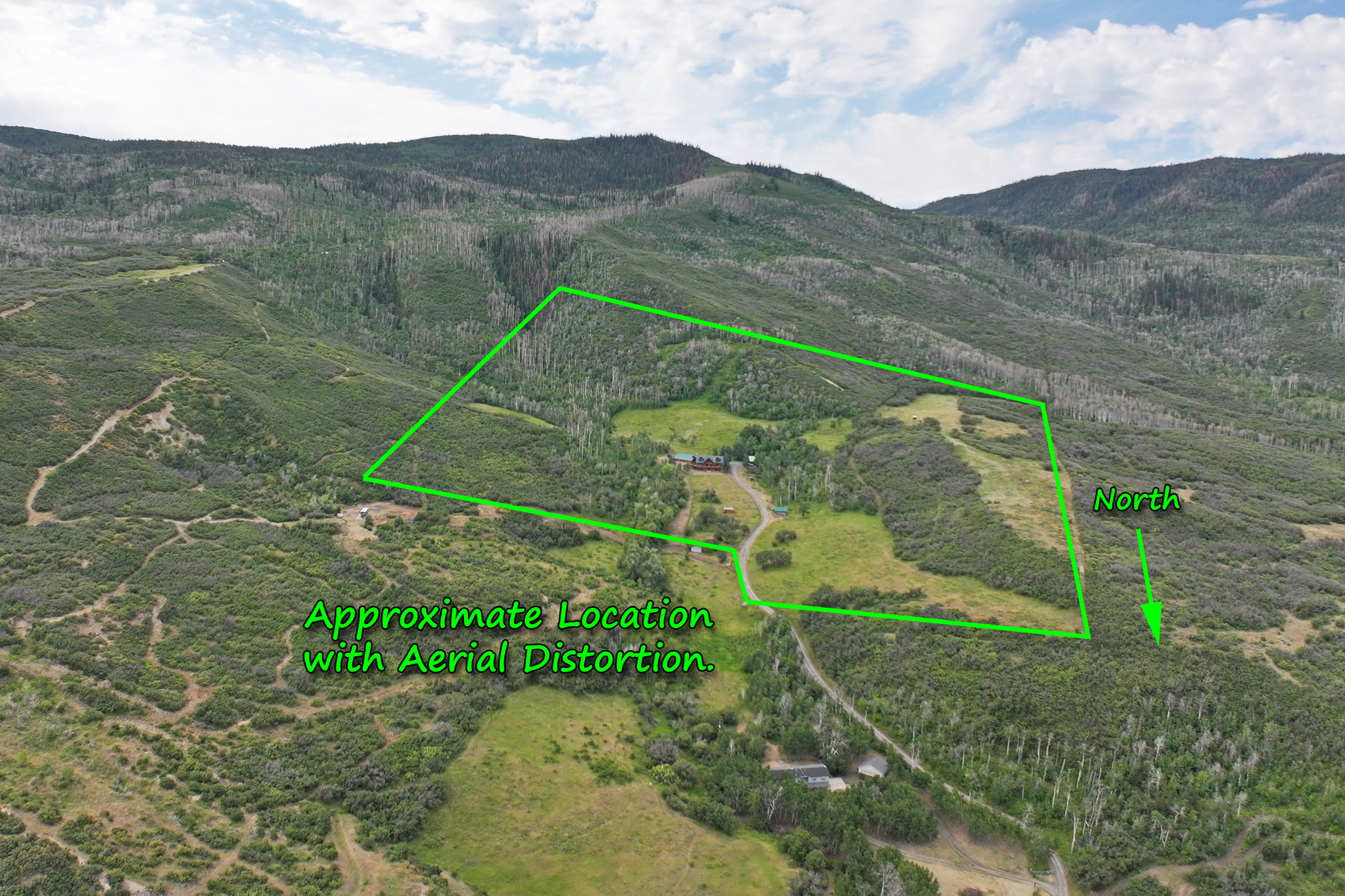 Luxury Log Home on Multiple Parcels For Sale on the Western Slope of Colorado