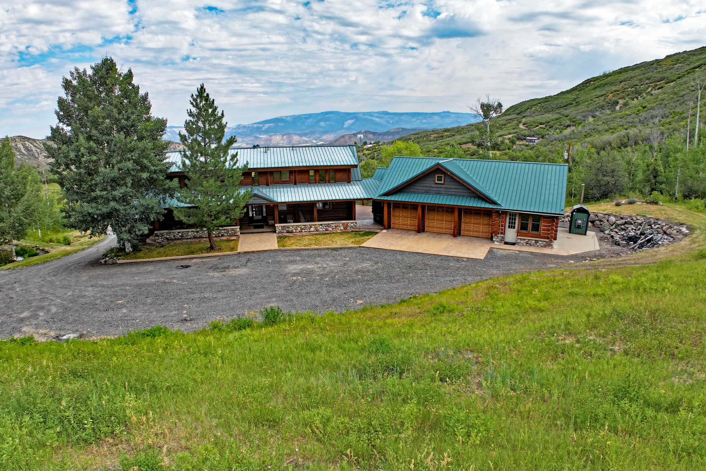 Luxury Log Home on Multiple Parcels For Sale on the Western Slope of Colorado