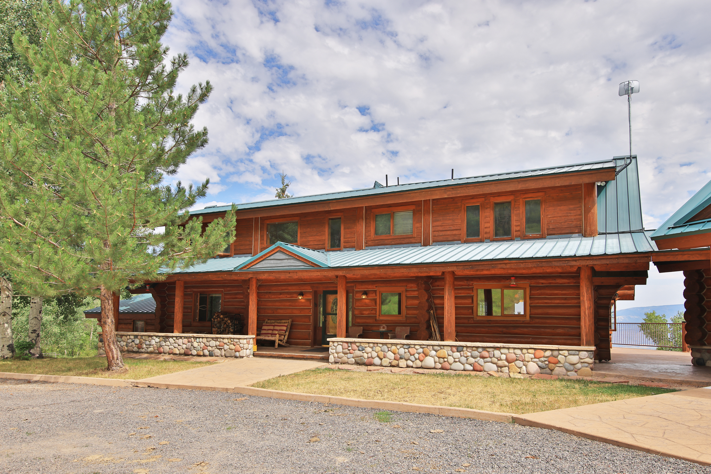Luxury Log Home on Multiple Parcels For Sale on the Western Slope of Colorado