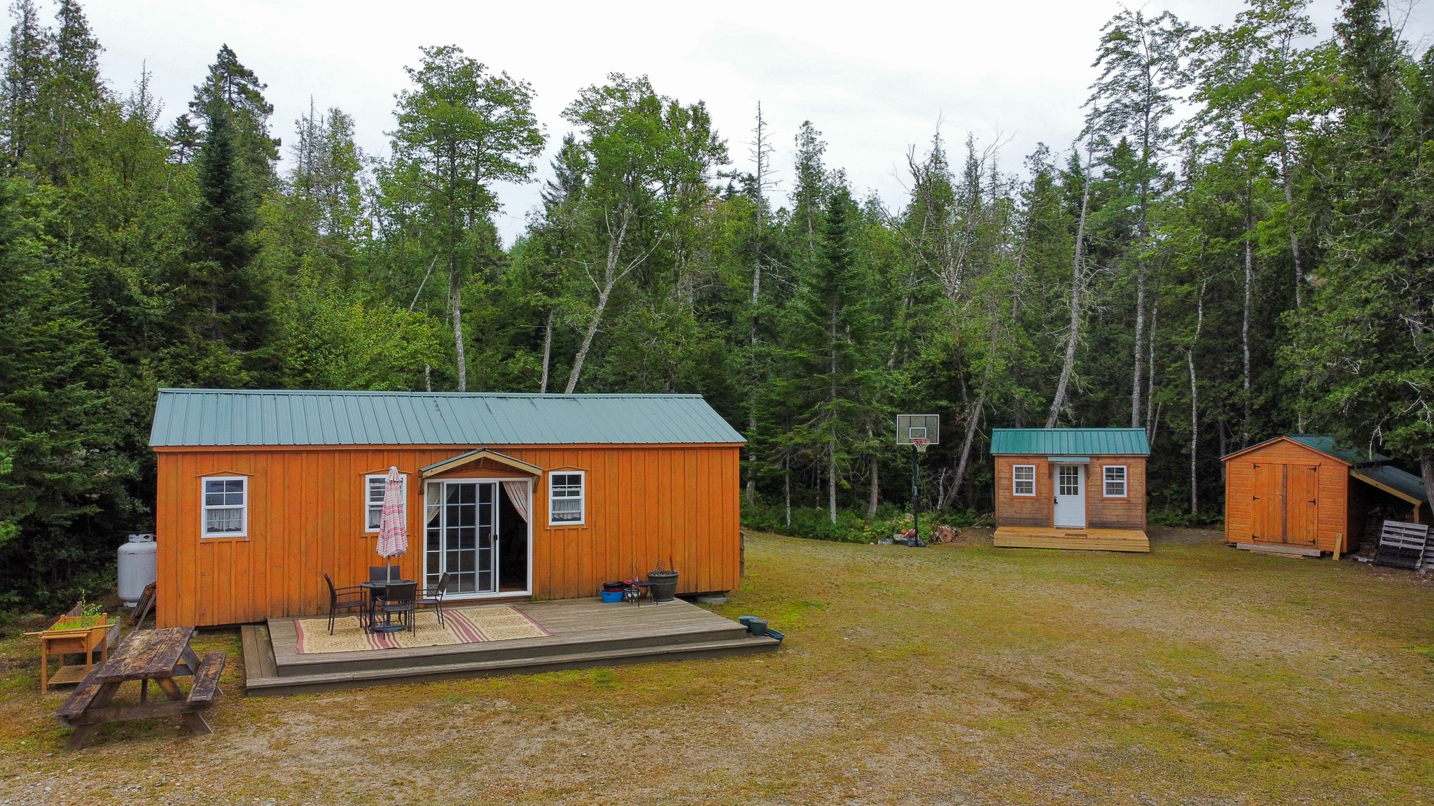 Camp with 584 Feet of Beachfront on Madagascal Pond