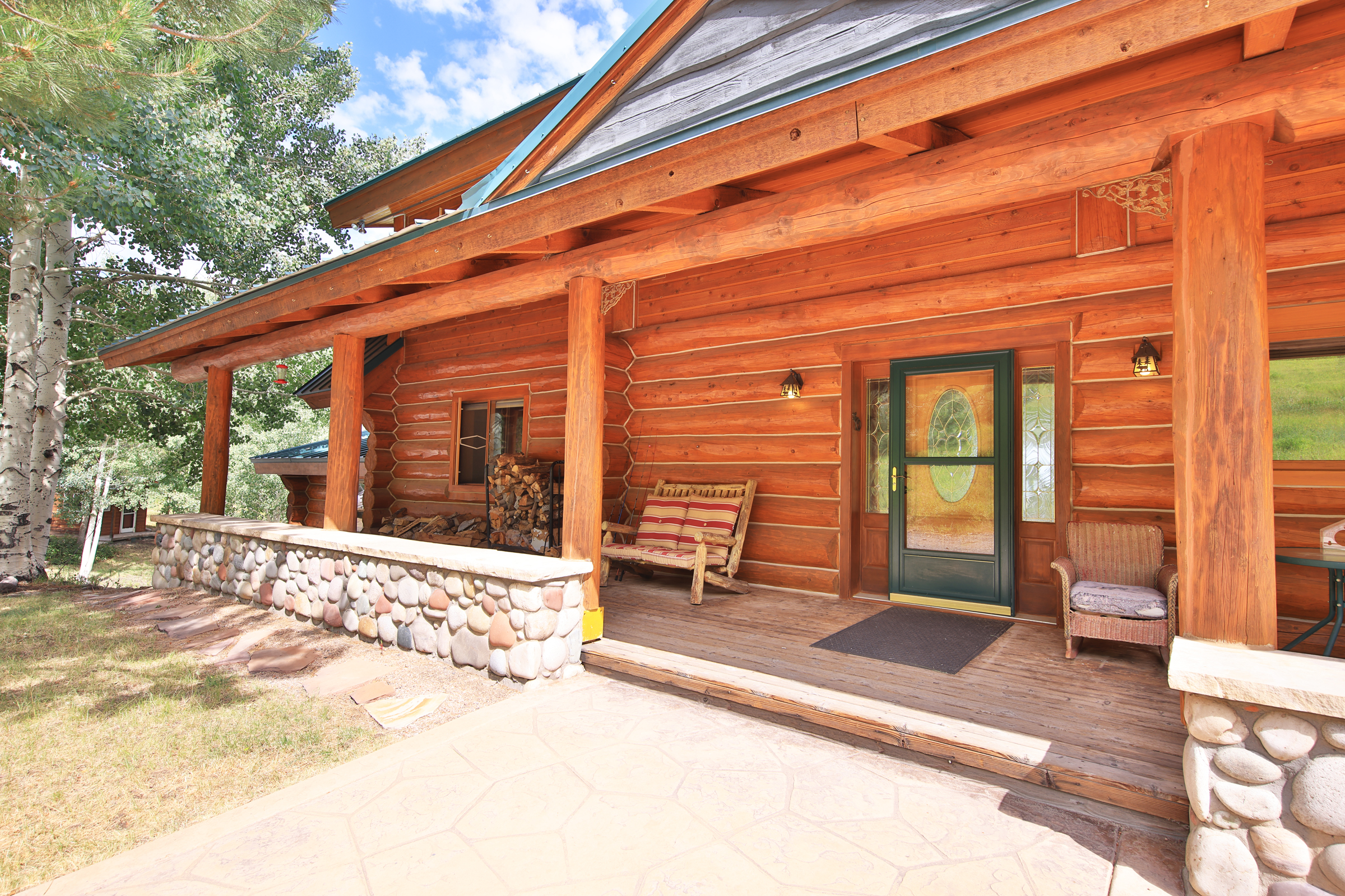 Luxury Log Home on Multiple Parcels For Sale on the Western Slope of Colorado