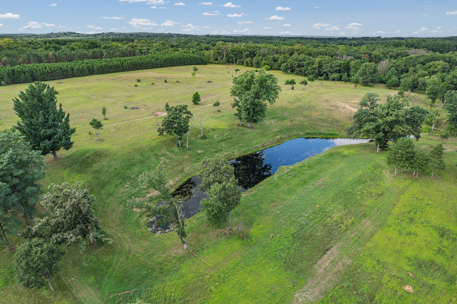 48.7+/- Acres Featuring a 2022 Single Wide Mobile Home Montello WI