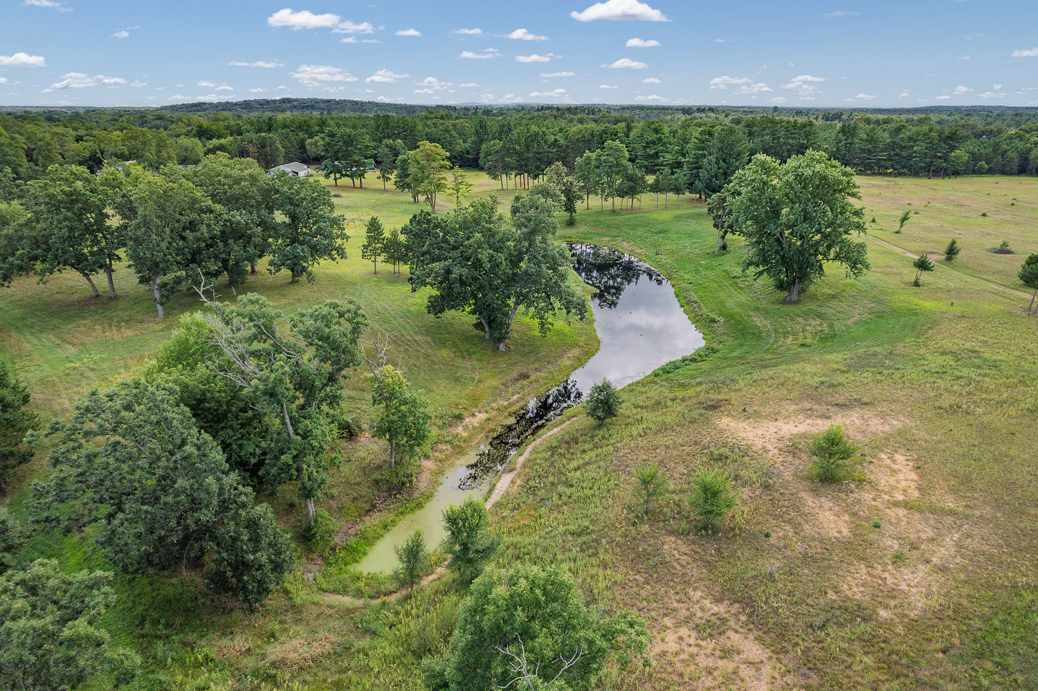 48.7+/- Acres Featuring a 2022 Single Wide Mobile Home Montello WI