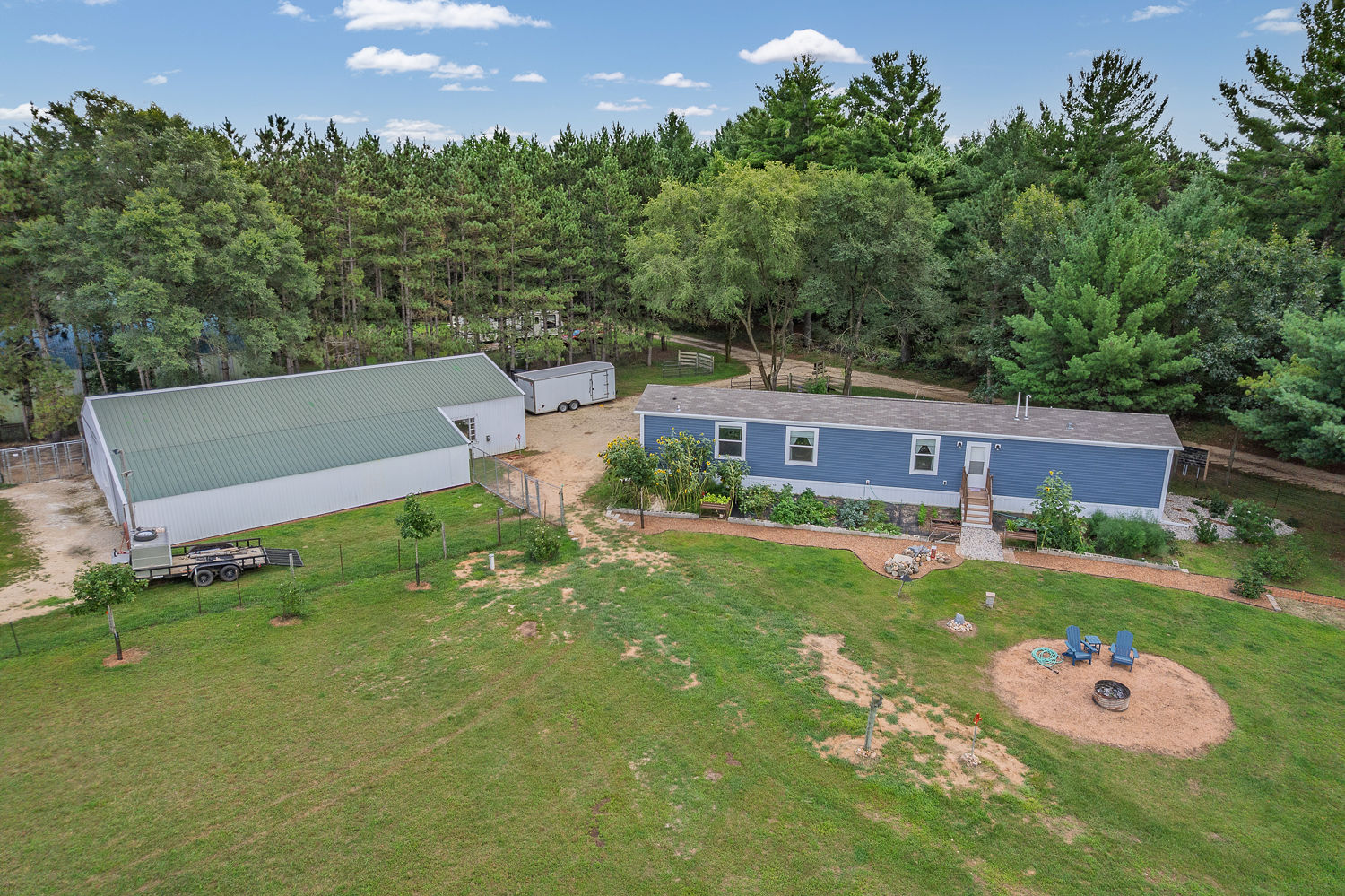 48.7+/- Acres Featuring a 2022 Single Wide Mobile Home Montello WI