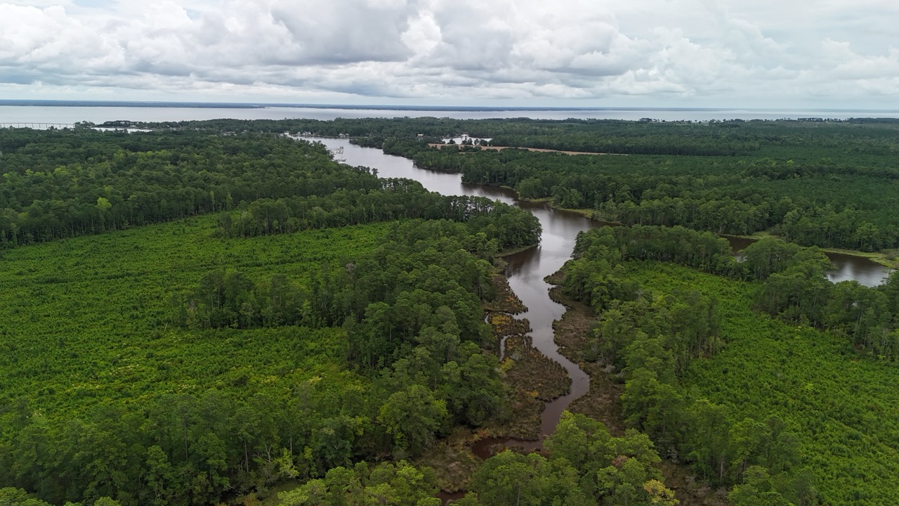214 AC of Land with Creek Frontage & Investment Potential