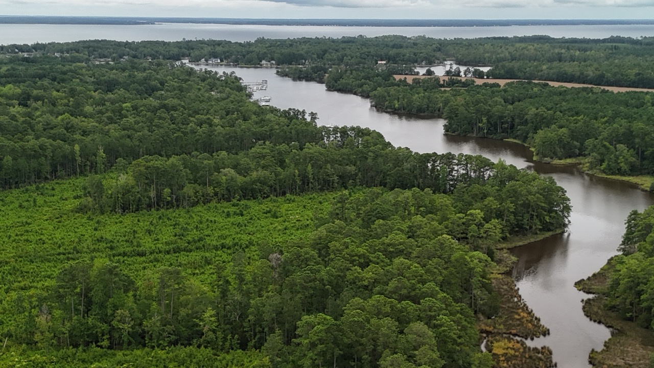 214 AC of Land with Creek Frontage & Investment Potential