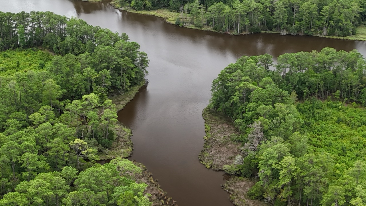 214 AC of Land with Creek Frontage & Investment Potential