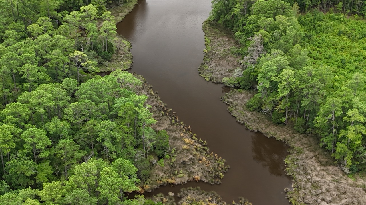 214 AC of Land with Creek Frontage & Investment Potential