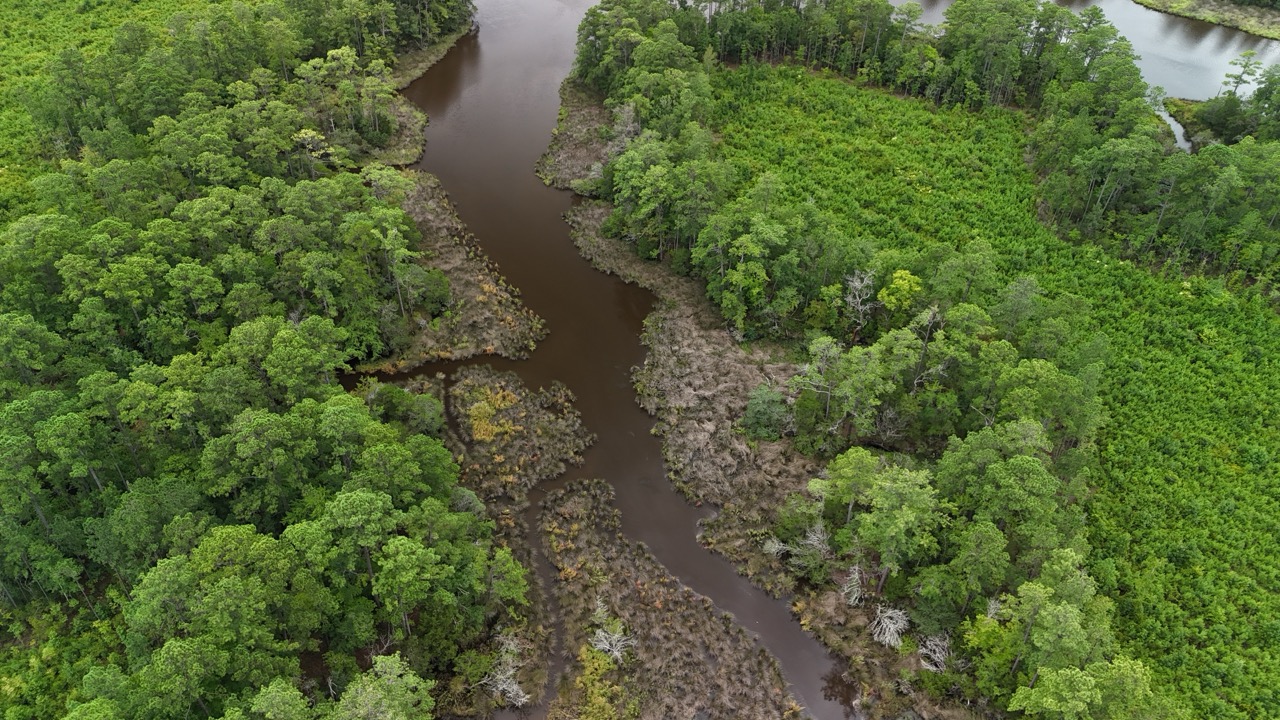 214 AC of Land with Creek Frontage & Investment Potential