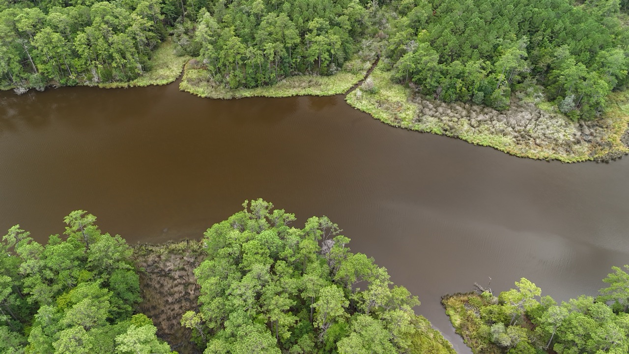 214 AC of Land with Creek Frontage & Investment Potential