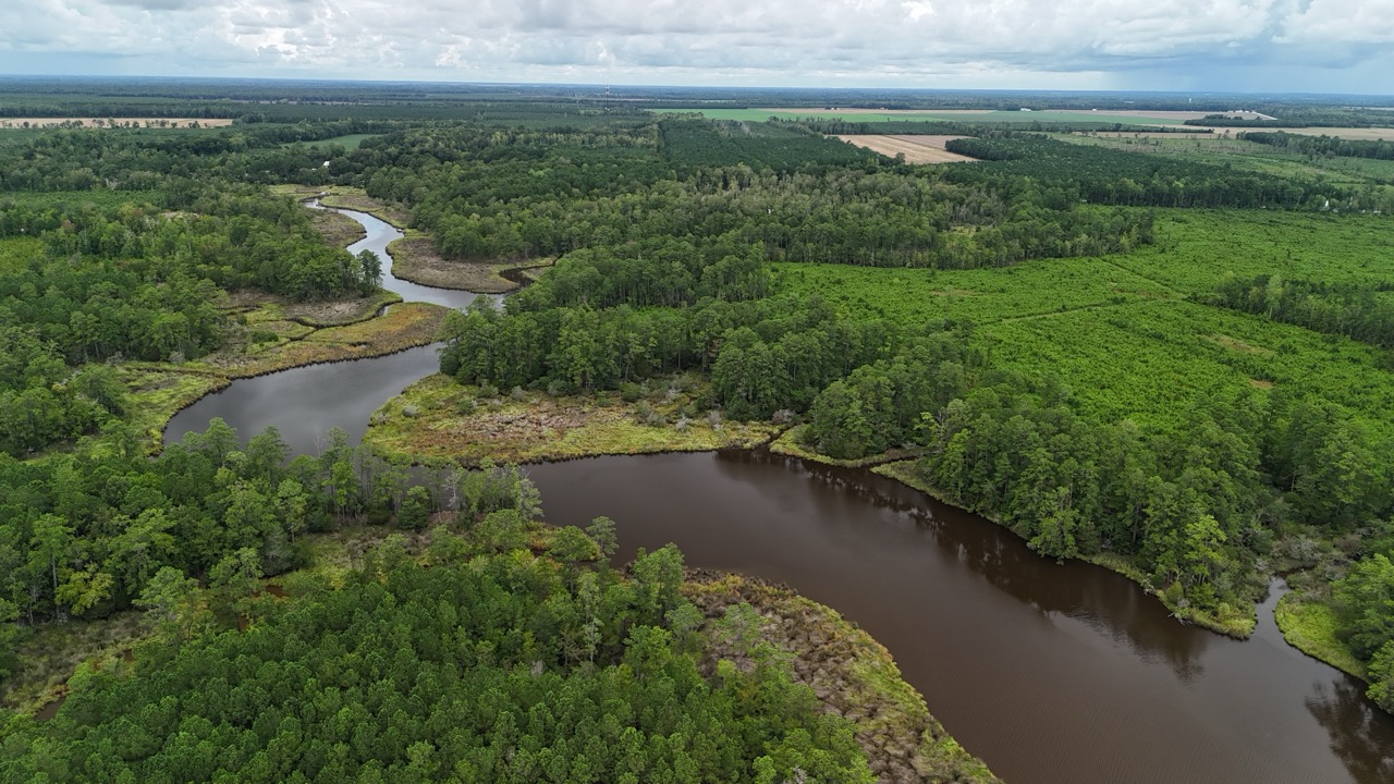 214 AC of Land with Creek Frontage & Investment Potential