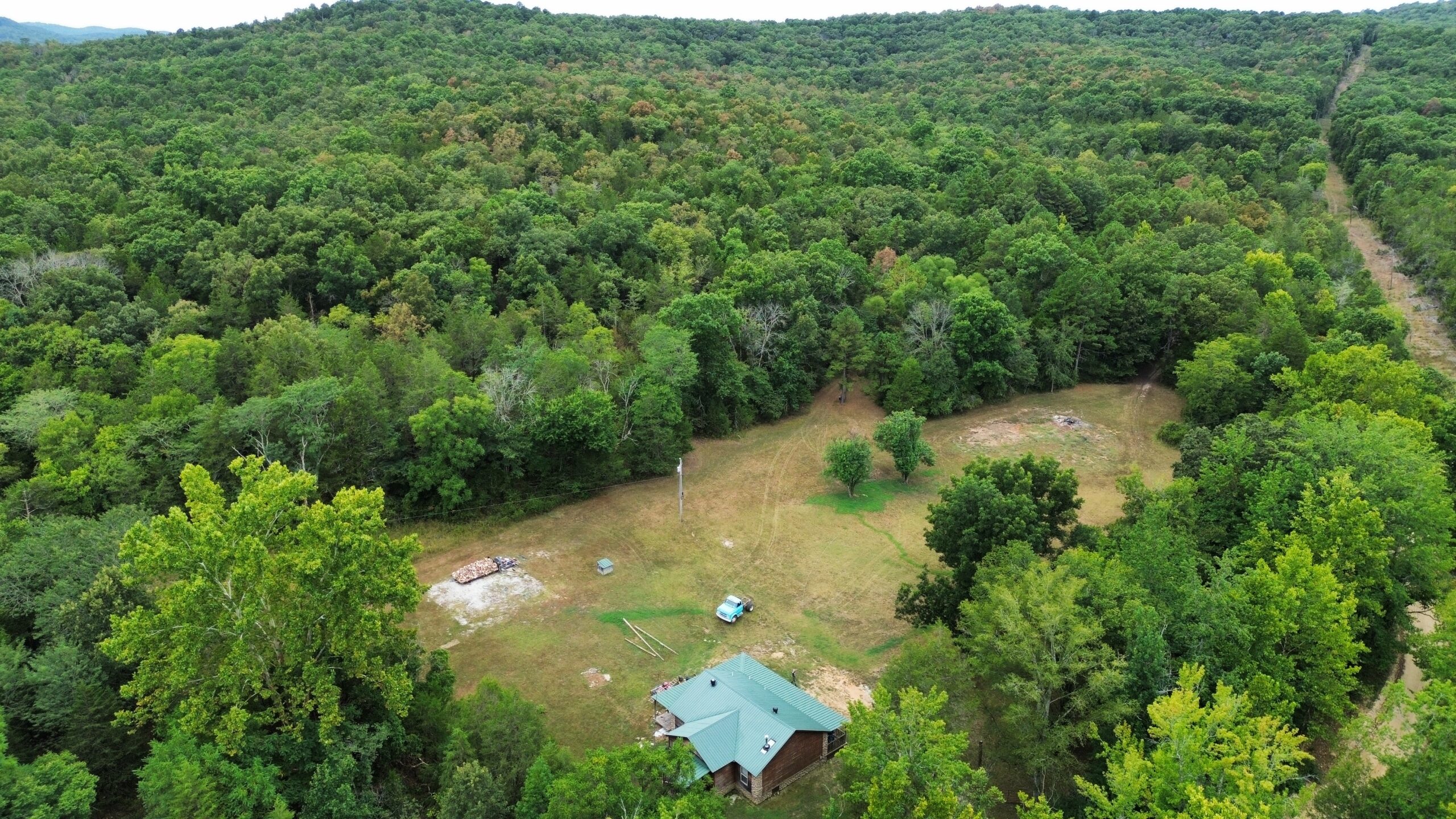 LOG CABIN AND HUNTING LAND FOR SALE IN NORTH CENTRAL ARKANSAS