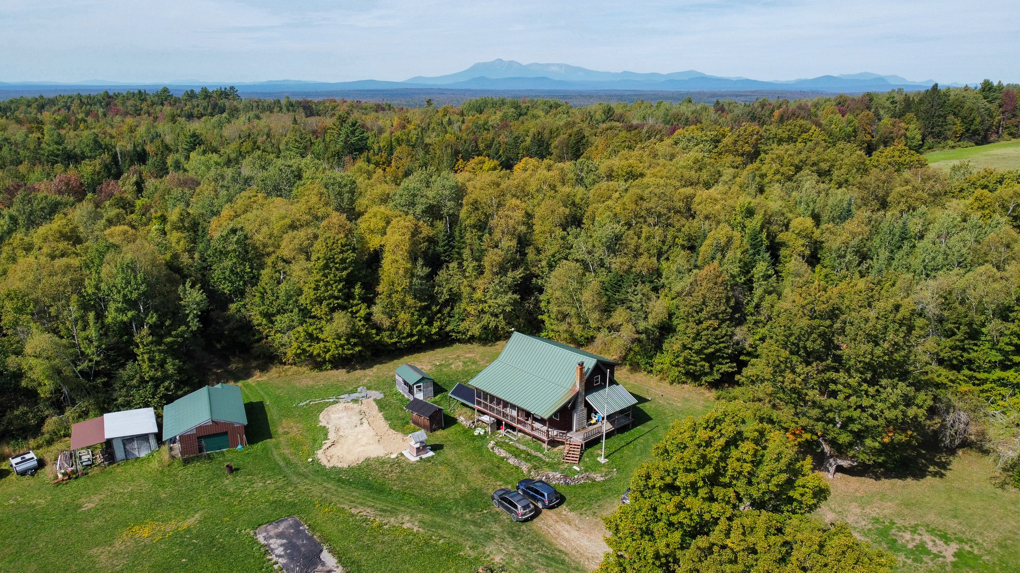 Off-Grid Log Home on 33.4 Acres