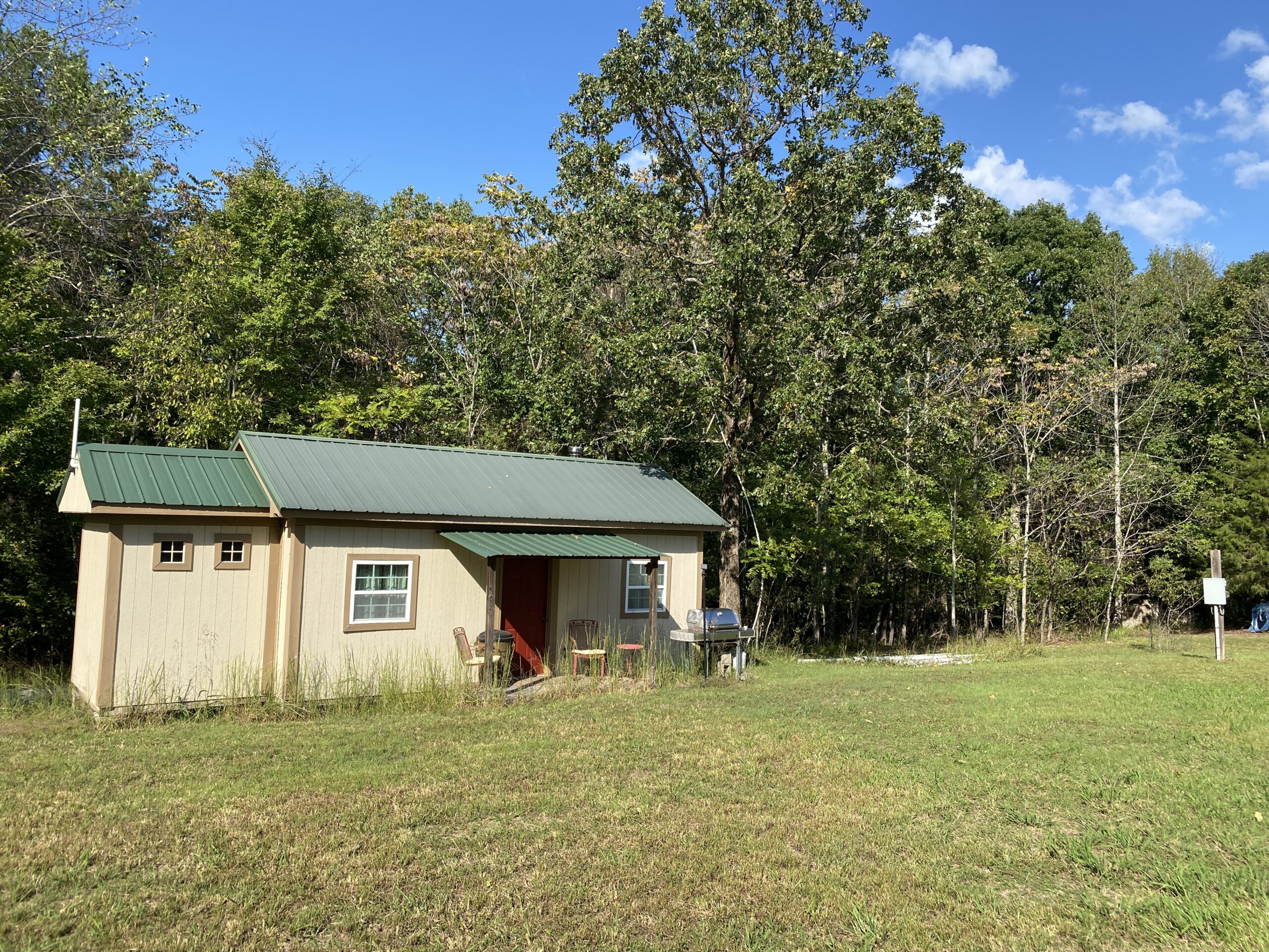 HUNTING CAMP FOR SALE IN TN. CABIN & STORAGE, 58 ACRES+/-
