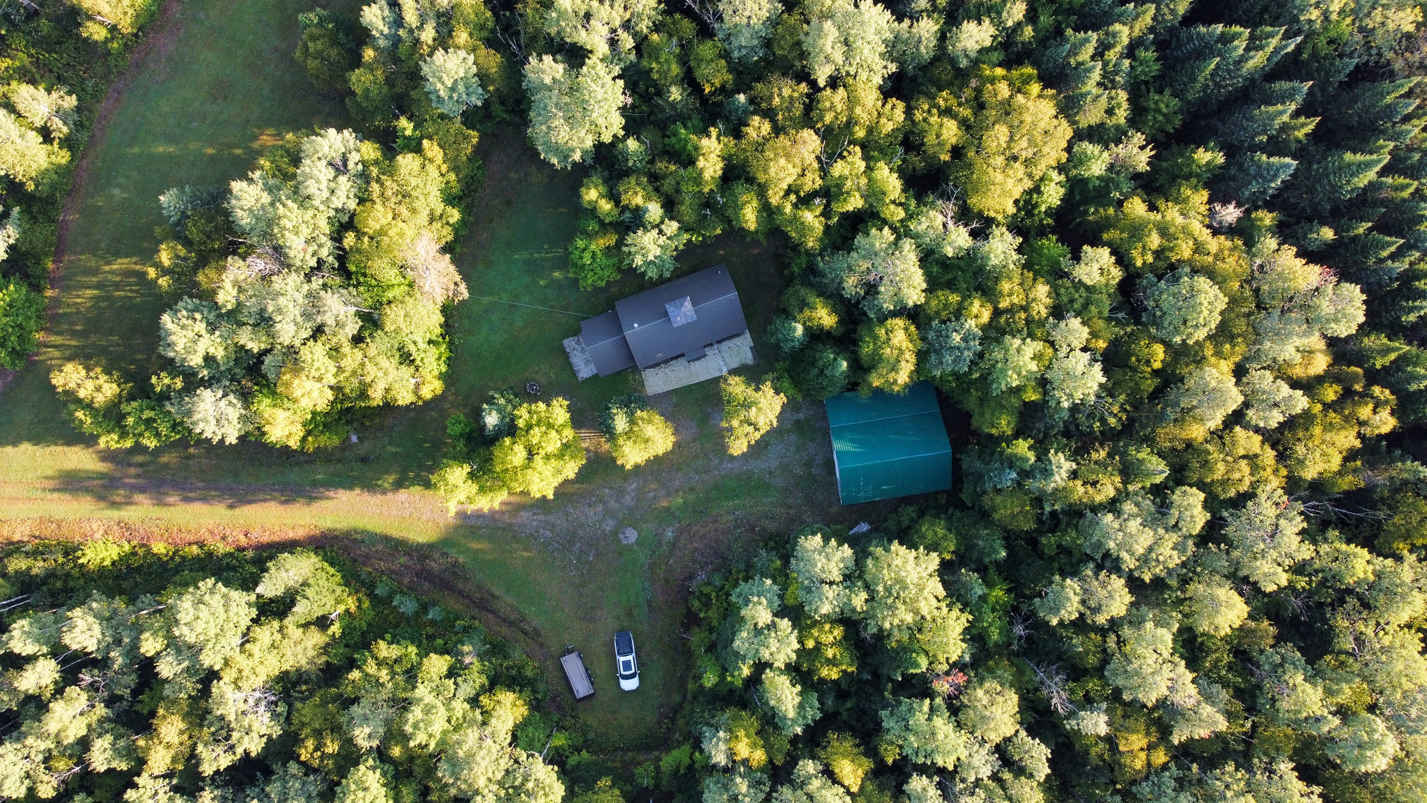 145 Acres with Timber Frame Cabin & Barn in Masardis, Maine