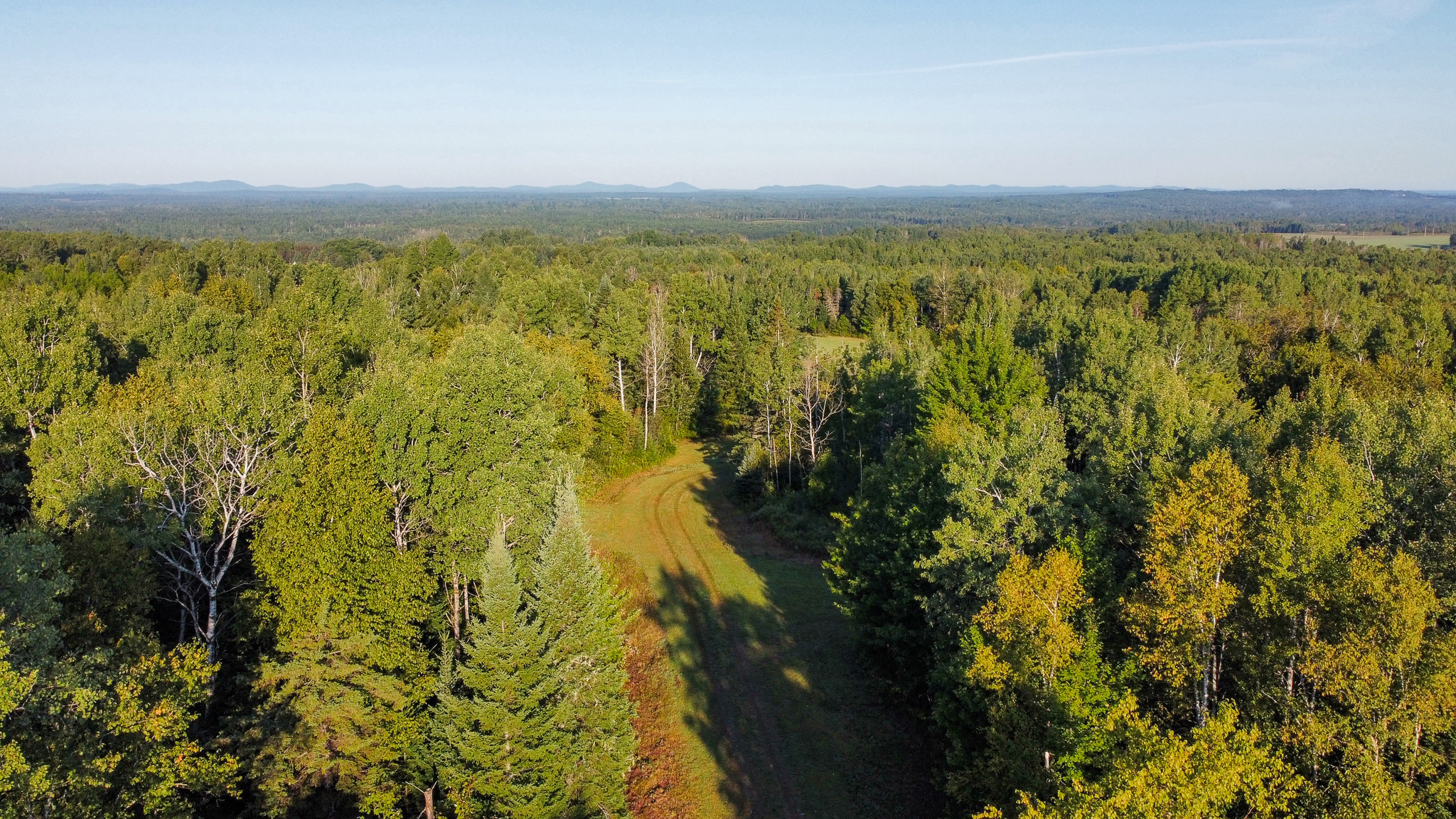 145 Acres with Timber Frame Cabin & Barn in Masardis, Maine