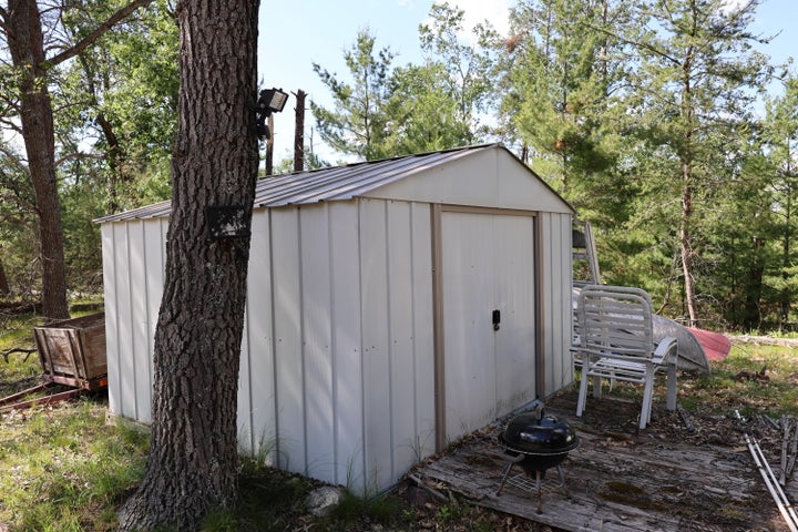 Cabin on 4 Lots in Canada Creek Ranch Atlanta MI