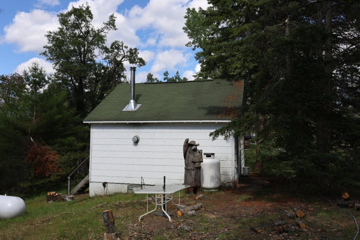 Cabin on 4 Lots in Canada Creek Ranch Atlanta MI