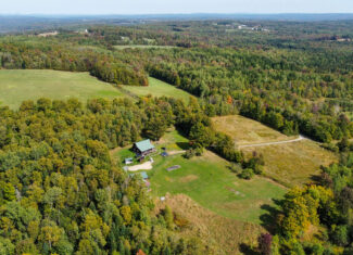 Off-Grid Log Home on 33.4 Acres