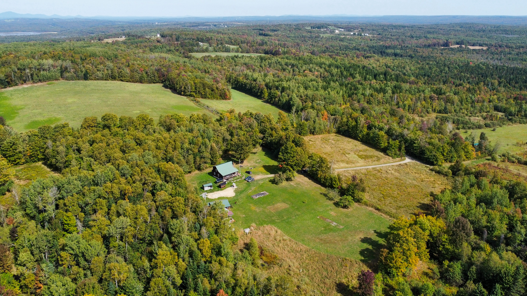 Off-Grid Log Home on 33.4 Acres
