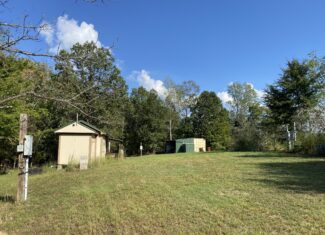 HUNTING CAMP FOR SALE IN TN. CABIN & STORAGE, 58 ACRES+/-