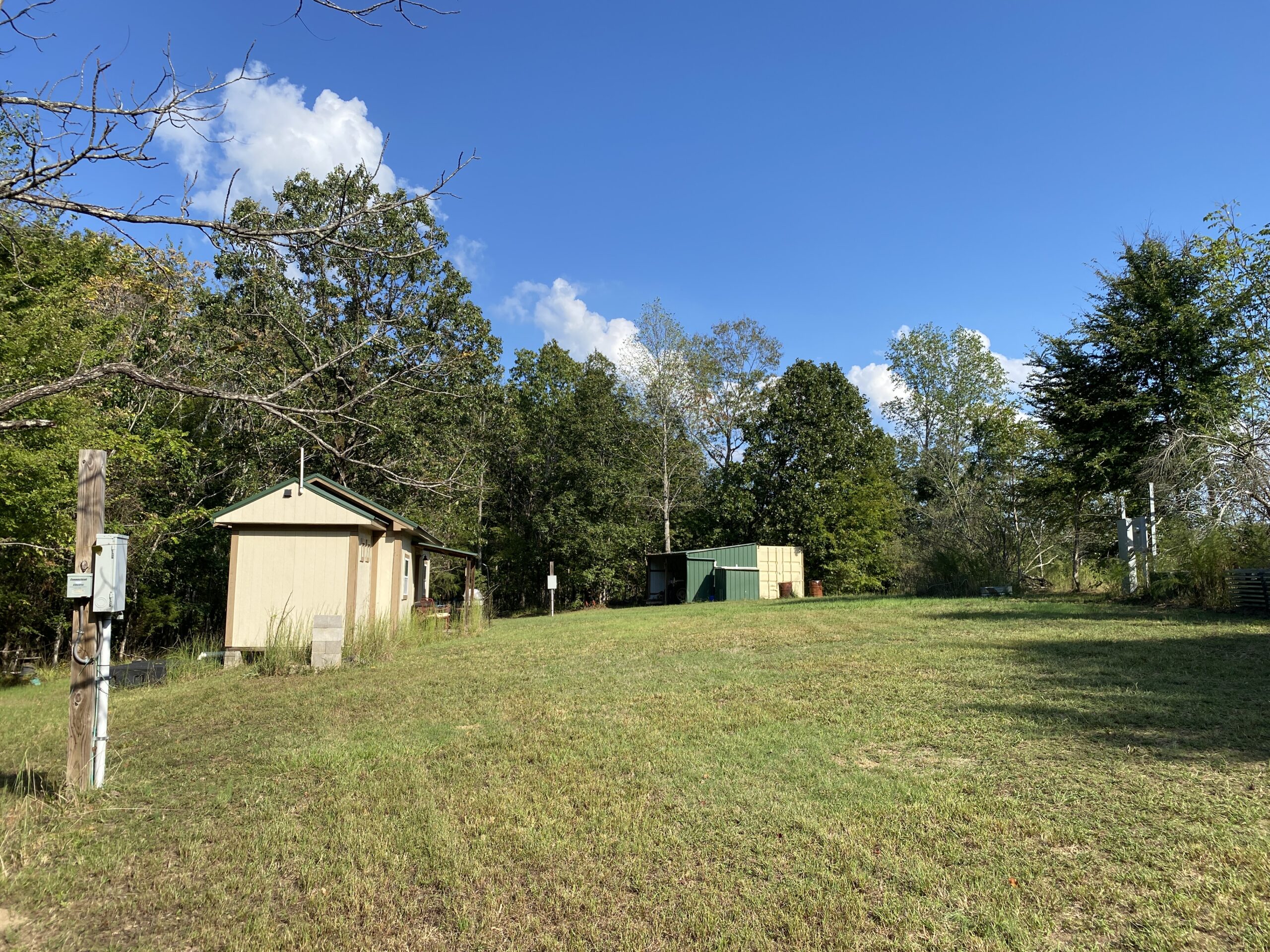 HUNTING CAMP FOR SALE IN TN. CABIN & STORAGE, 58 ACRES+/-