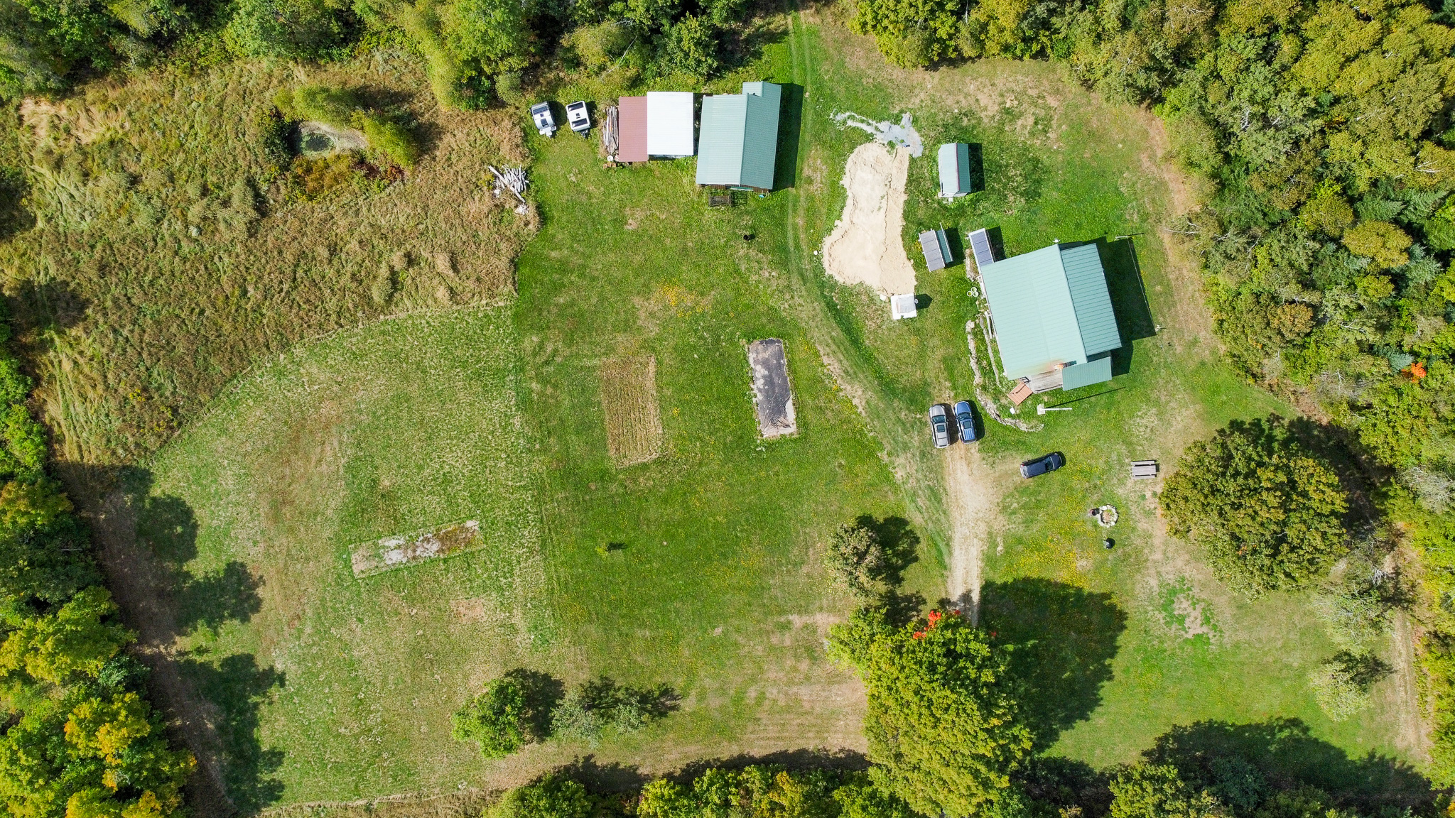 Off-Grid Log Home on 33.4 Acres