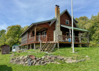 Off-Grid Log Home on 33.4 Acres