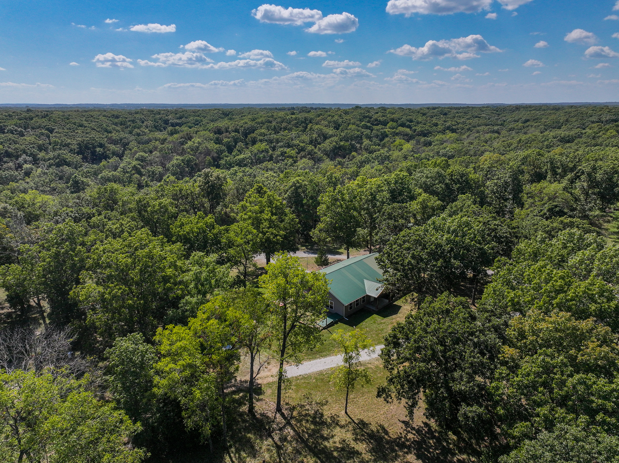 Home on 109+\- acres in Collins MO